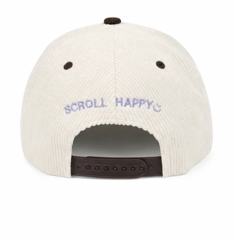 Back of the cream corduroy UP cap with Scroll Happy embroidered in lavender and a brown snapback closure